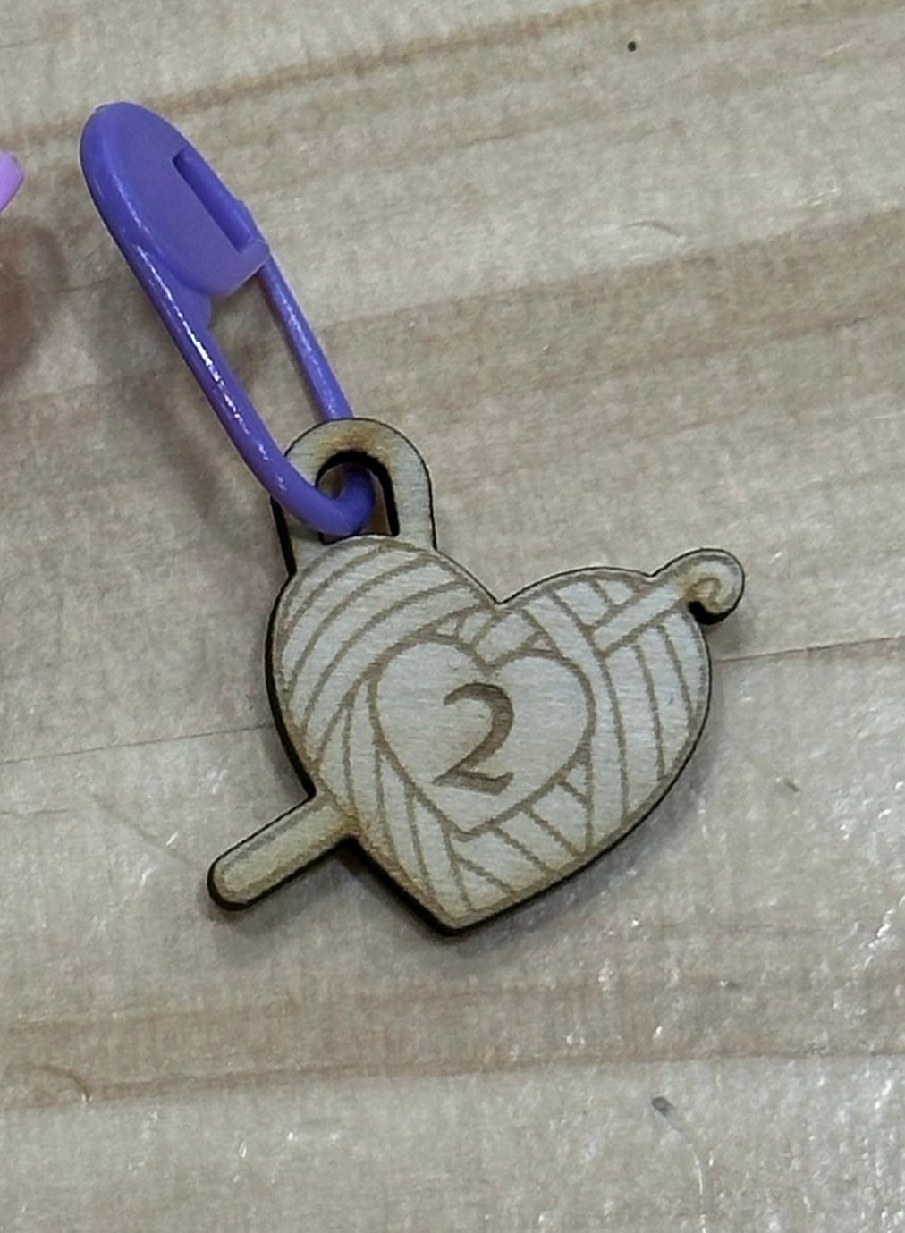 Marcador de aguja para crochet